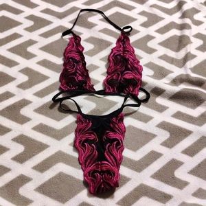 Extreme lingerie, purple/pink and black, size small, bra top and thong bottom.